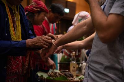 Traditional welcome for participants at the APC 2024 Community Gathering image linking to “We trust APC, and you trust in members, and that’s something that comes with this network”: Interviews with new APC members at the 2024 Community Gathering